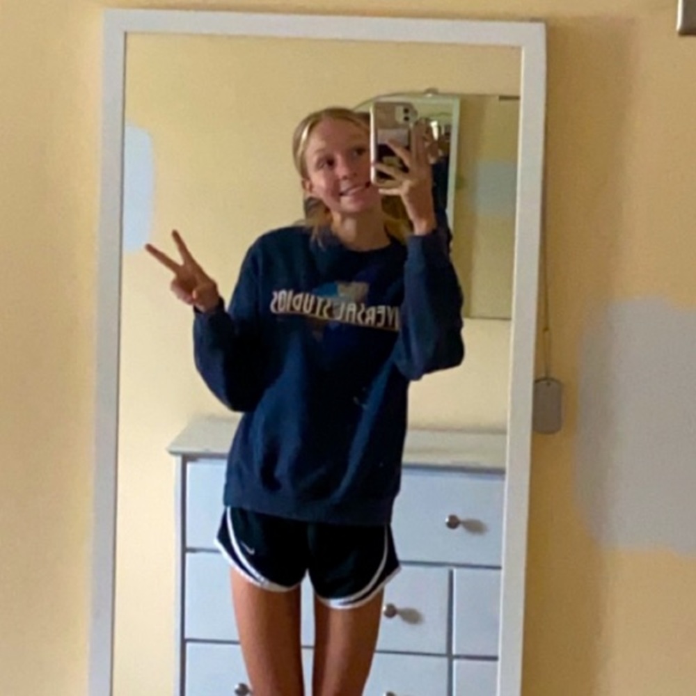 Universal Studios crew neck, navy blue background, size S/M